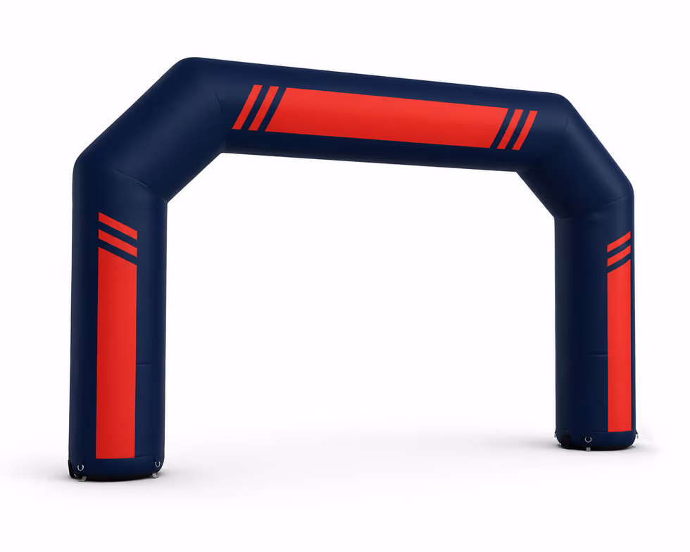 Arche gonflable publicitaire navy et rouge marquant l'entrée d'un événement sportif